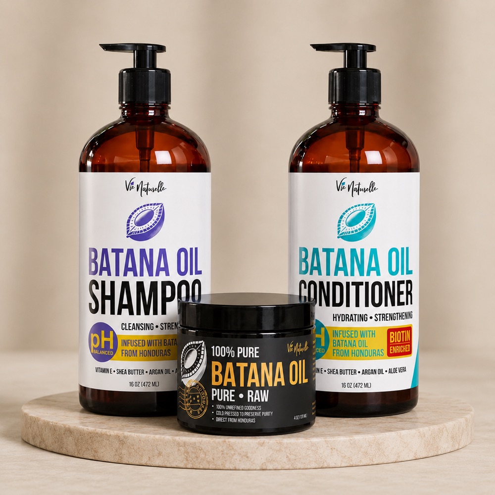 Vie Naturelle Complete Batana Oil System — Shampoo, Conditioner, and 4 oz Pure Batana Oil on a cream-stone background